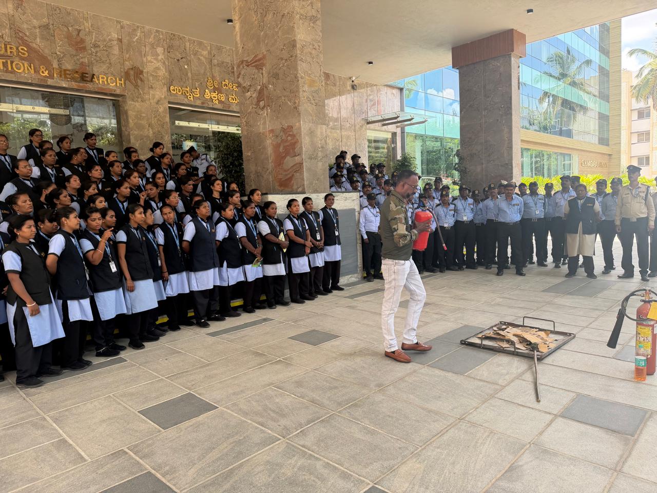Live fire drill demonstration in front of SDC staff at a campus entrance