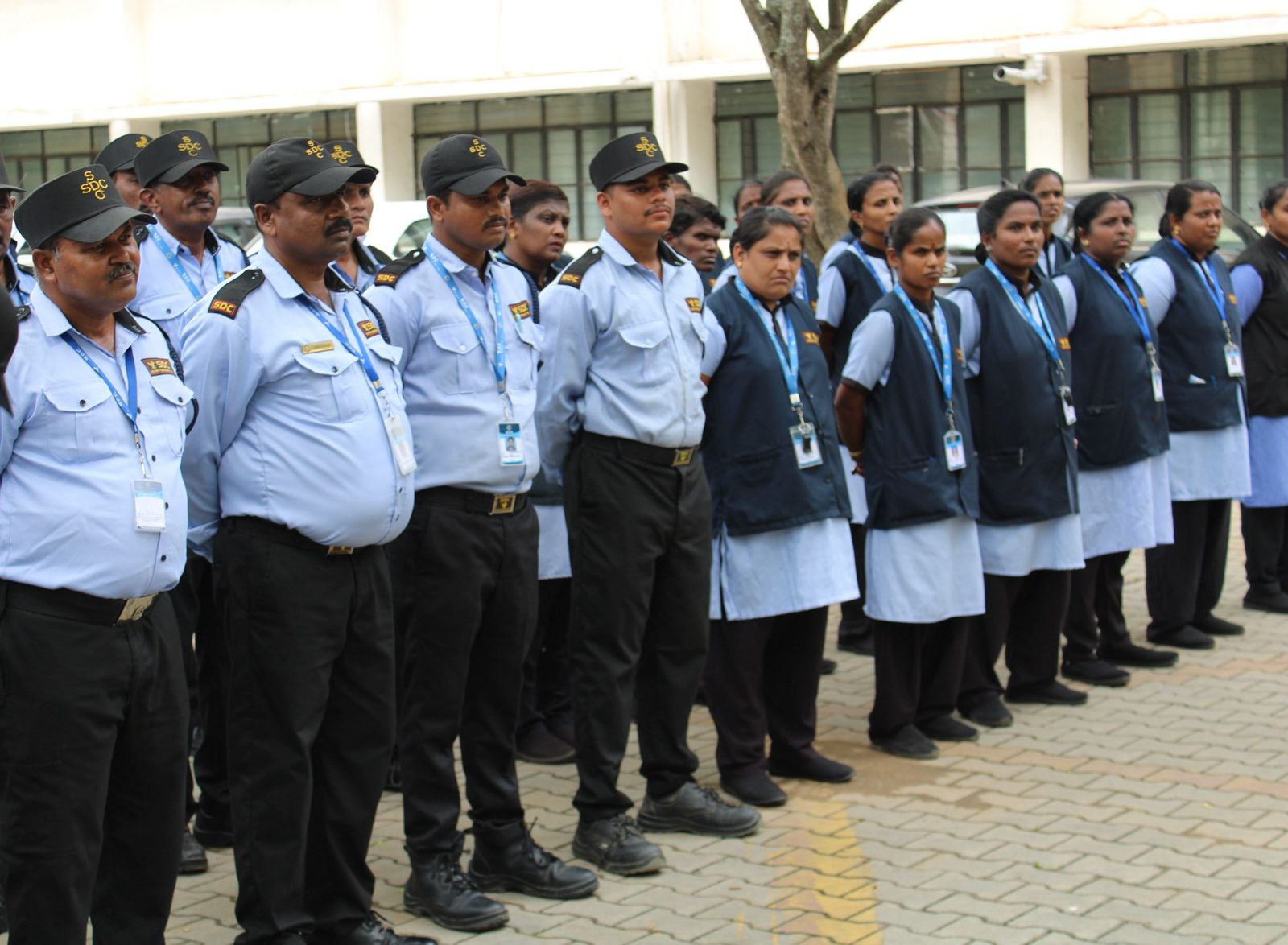 SDC security and housekeeping staff lined up for parade